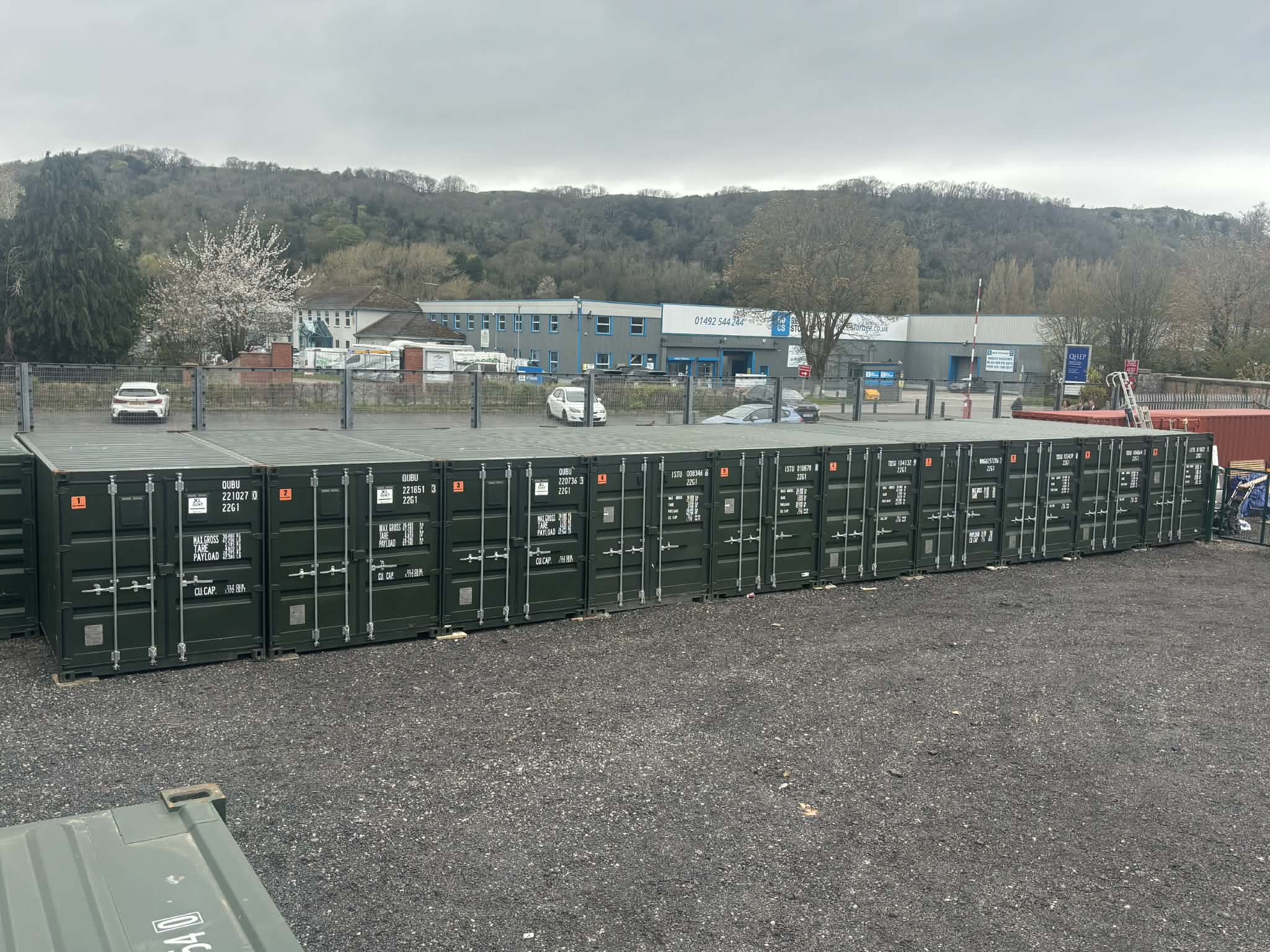 Row of storage containers and yard space at the Arfor Solutions site